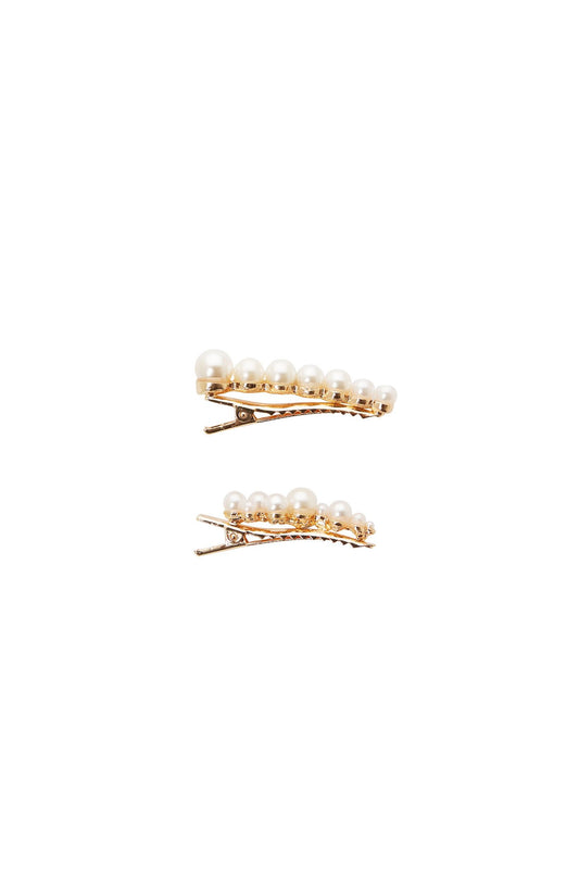Pair of Mini Pearl pinch clips, side view, with white pearls and gold tone clip, by L. Erickson