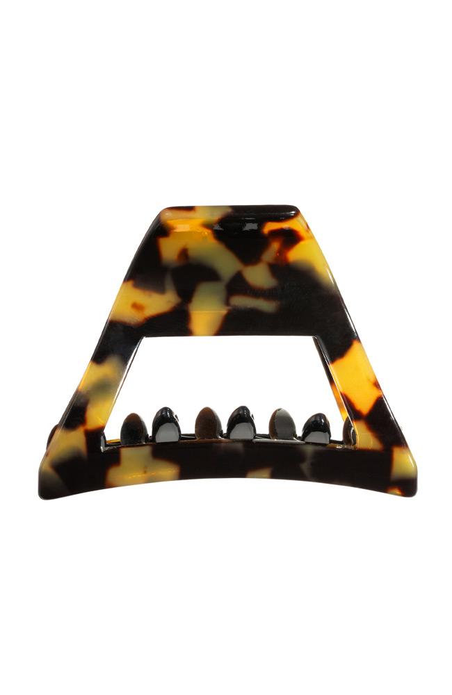 Tokyo Cutout Claw Hair Clip. Downtown Jaw features squared edges, a strong spring closure and cellulose acetate, by France Luxe